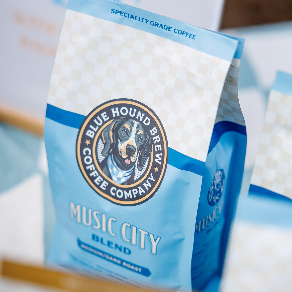 The Hocking Hills Store Music City Blend coffee bag with a blue hound dog logo and medium-dark roast.