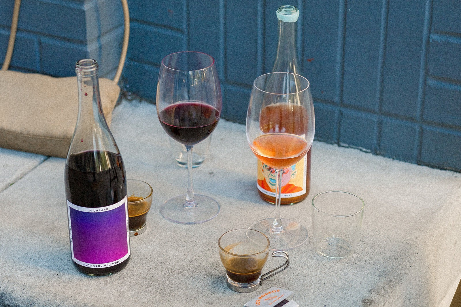 The Hocking Hills Store Chaand Sampler: red wine, orange wine, and skin-contact orange wine in bottles and glasses.