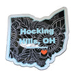 The Hocking Hills Store Paisley Ohio magnet shaped like the state of Ohio with a black paisley design and light blue text.