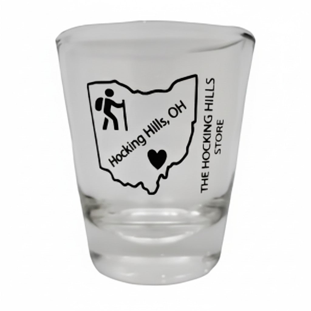 The Hocking Hills Store Ohio shot glass featuring a hiker icon and "Hocking Hills, OH" text. Clear glass.