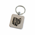 The Hocking Hills Store wooden keychain featuring a laser-engraved Ohio map with a floral paisley design.
