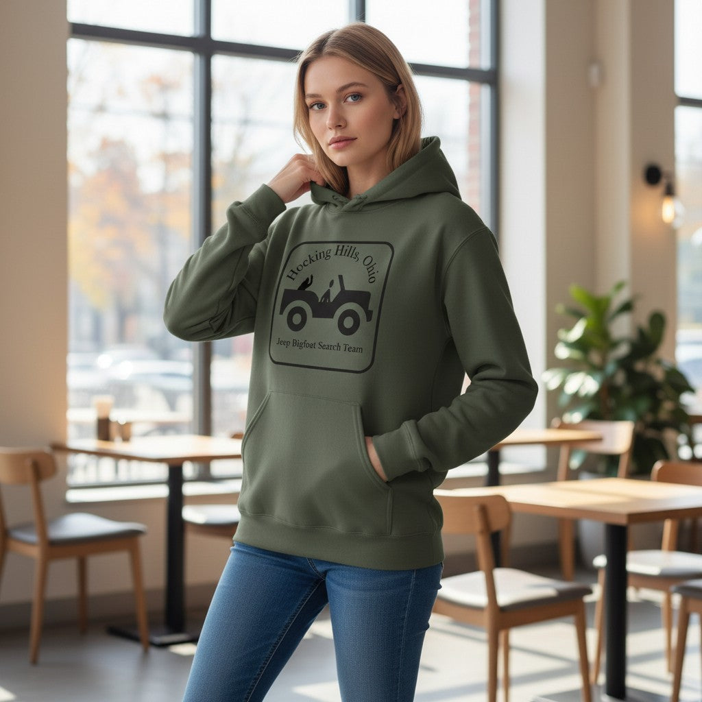 The Hocking Hills Store olive green cotton-blend hoodie with a black graphic of a Jeep and the text "Hocking Hills, Ohio Jeep Bigfoot Search Team".