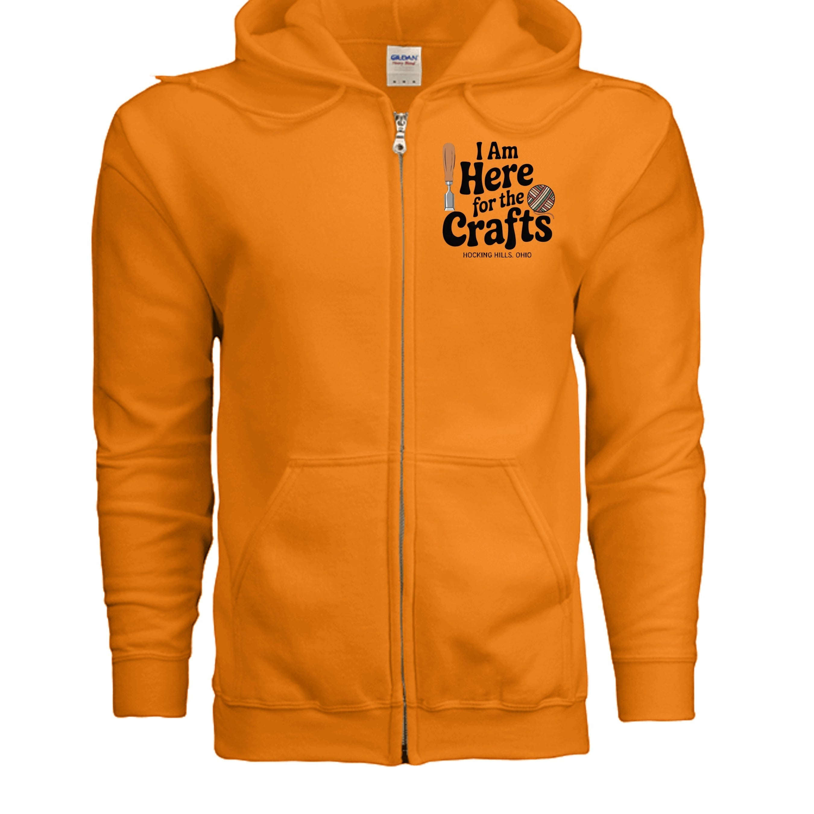 The Hocking Hills Store orange zip-up hoodie with "I Am Here for the Crafts" graphic and a YKK metal zipper.