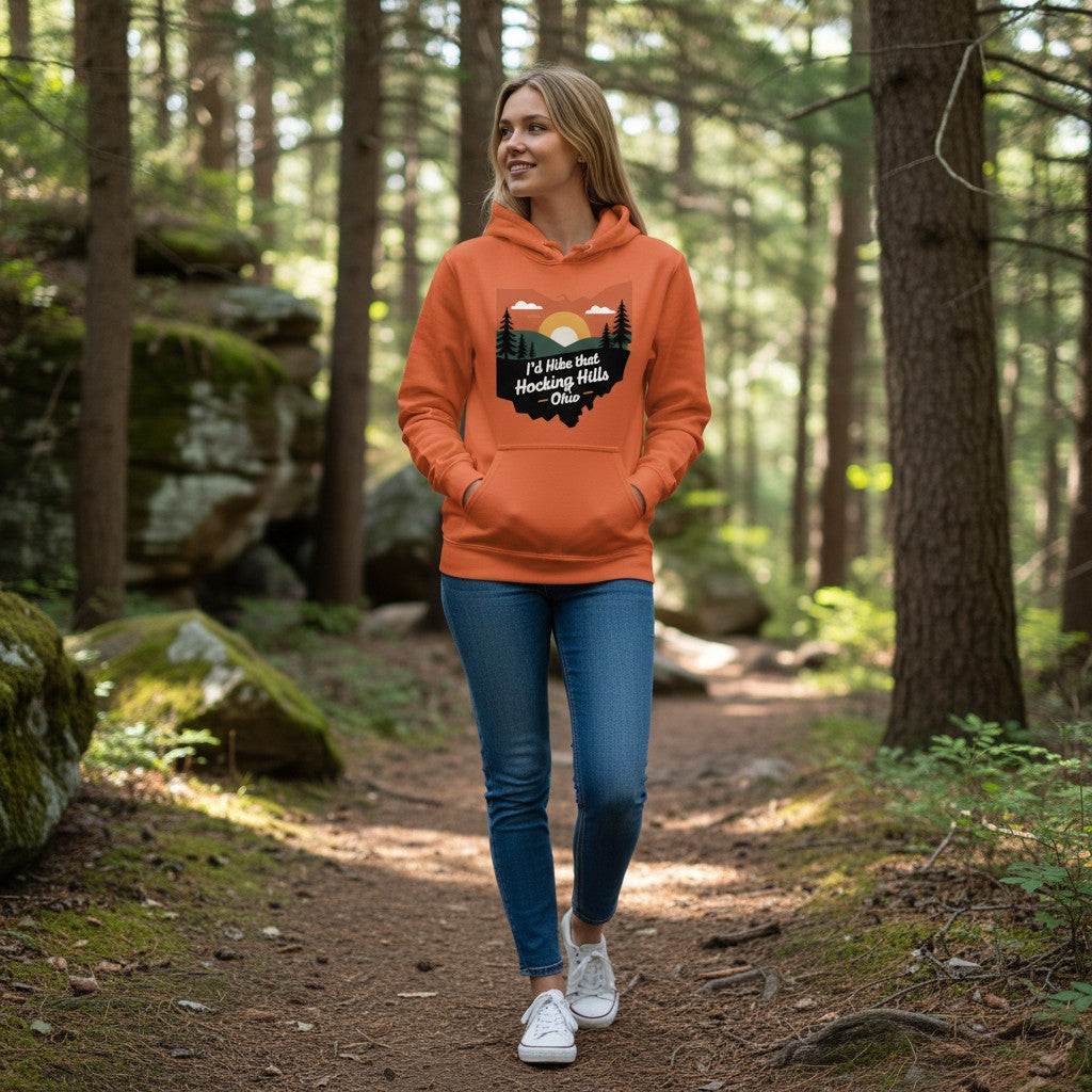 The Hocking Hills Store orange cotton blend hoodie with "I'd Hike That Hocking Hills - Ohio" graphic. Features a scenic mountain and sunset design.