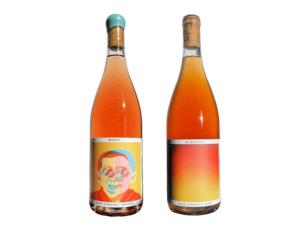 The Hocking Hills Store Orange Wine Sampler featuring two bottles: Monje Skin-Contact Orange Wine and '22 Bheeyo Skin-Contact Wine.