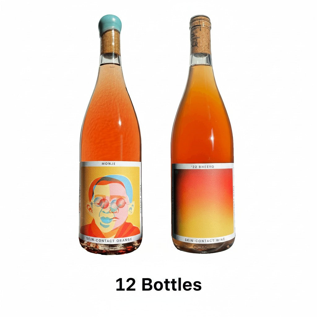 The Hocking Hills Store Orange Wine Sampler featuring two bottles: Monje Skin-Contact Orange Wine and '22 Bheeyo Skin-Contact Wine.