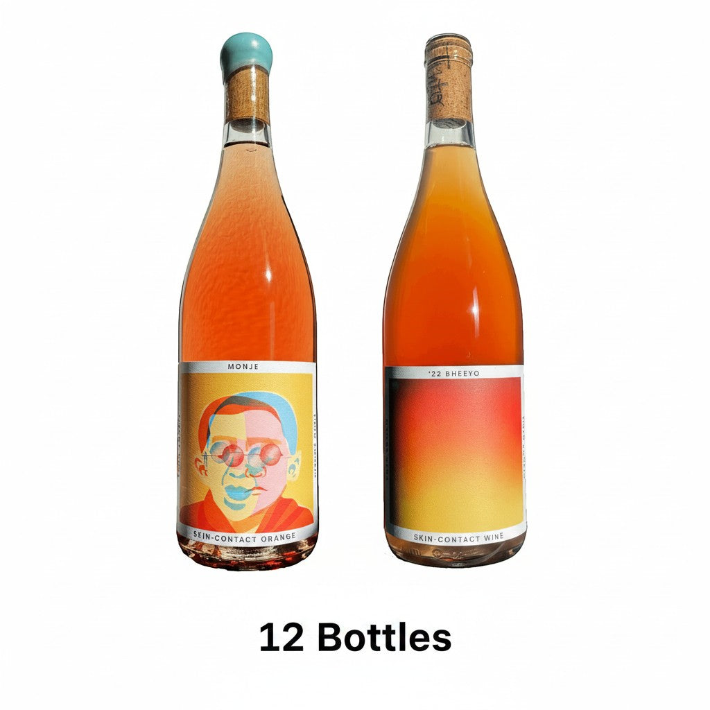 The Hocking Hills Store Orange Wine Sampler: two bottles of skin-contact orange wine, Monje and Bheeyo, with artistic labels.
