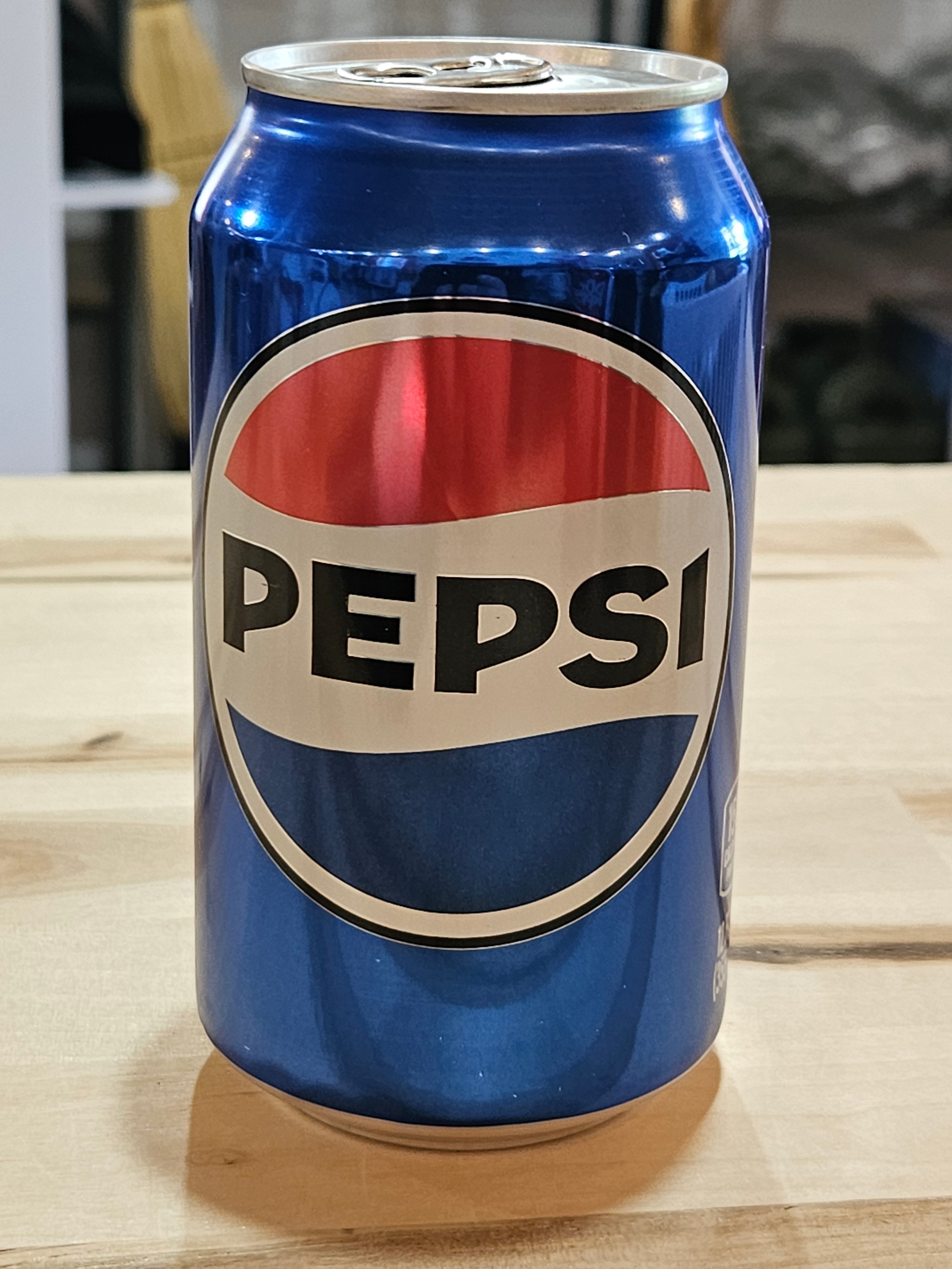 The Hocking Hills Store refreshing blue Pepsi soda can on a wooden table