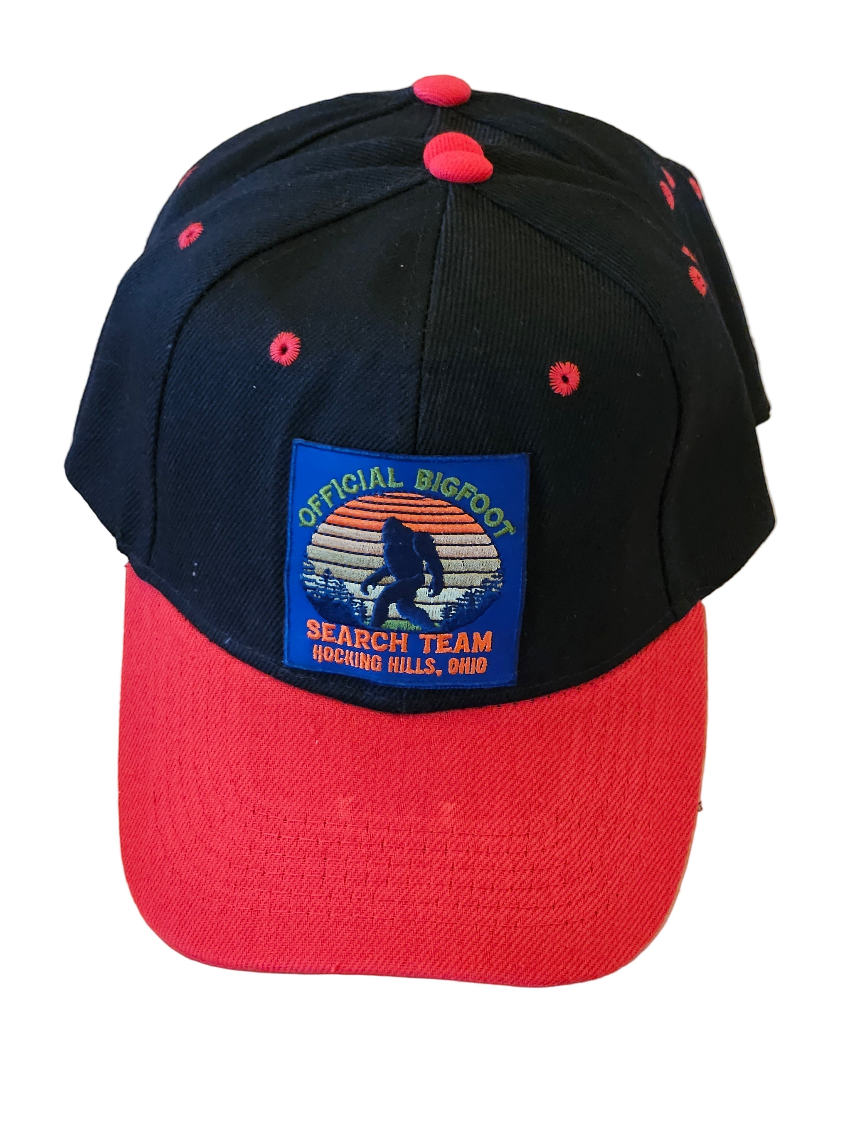 The Hocking Hills Store red and black Bigfoot Search Team baseball cap with embroidered patch.