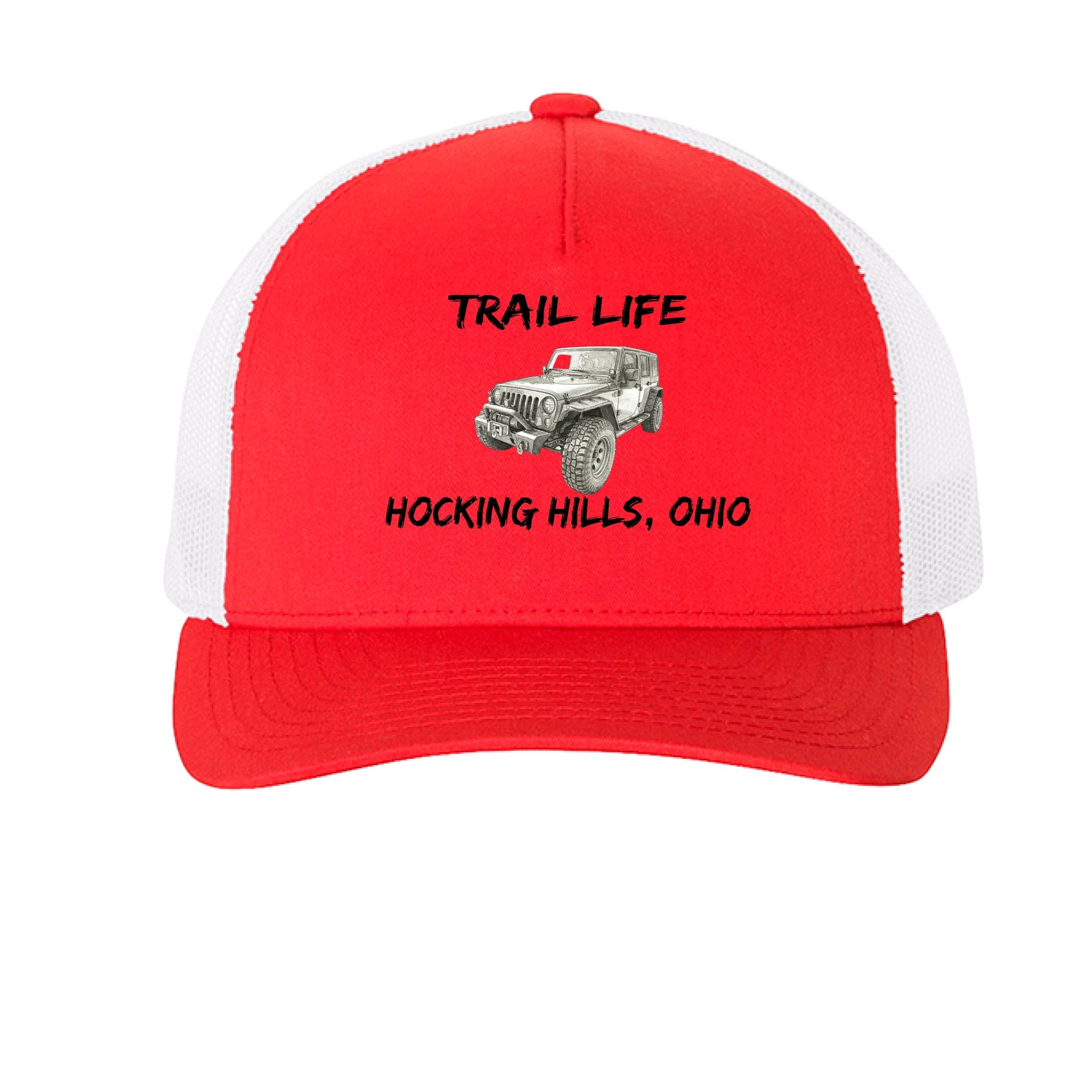 The Hocking Hills Store red and white trucker hat with "Trail Life" and a Jeep graphic.
