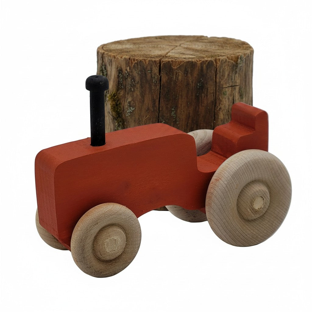 The Hocking Hills Store handmade wooden toy tractor in red with natural wood wheels and black exhaust pipe.