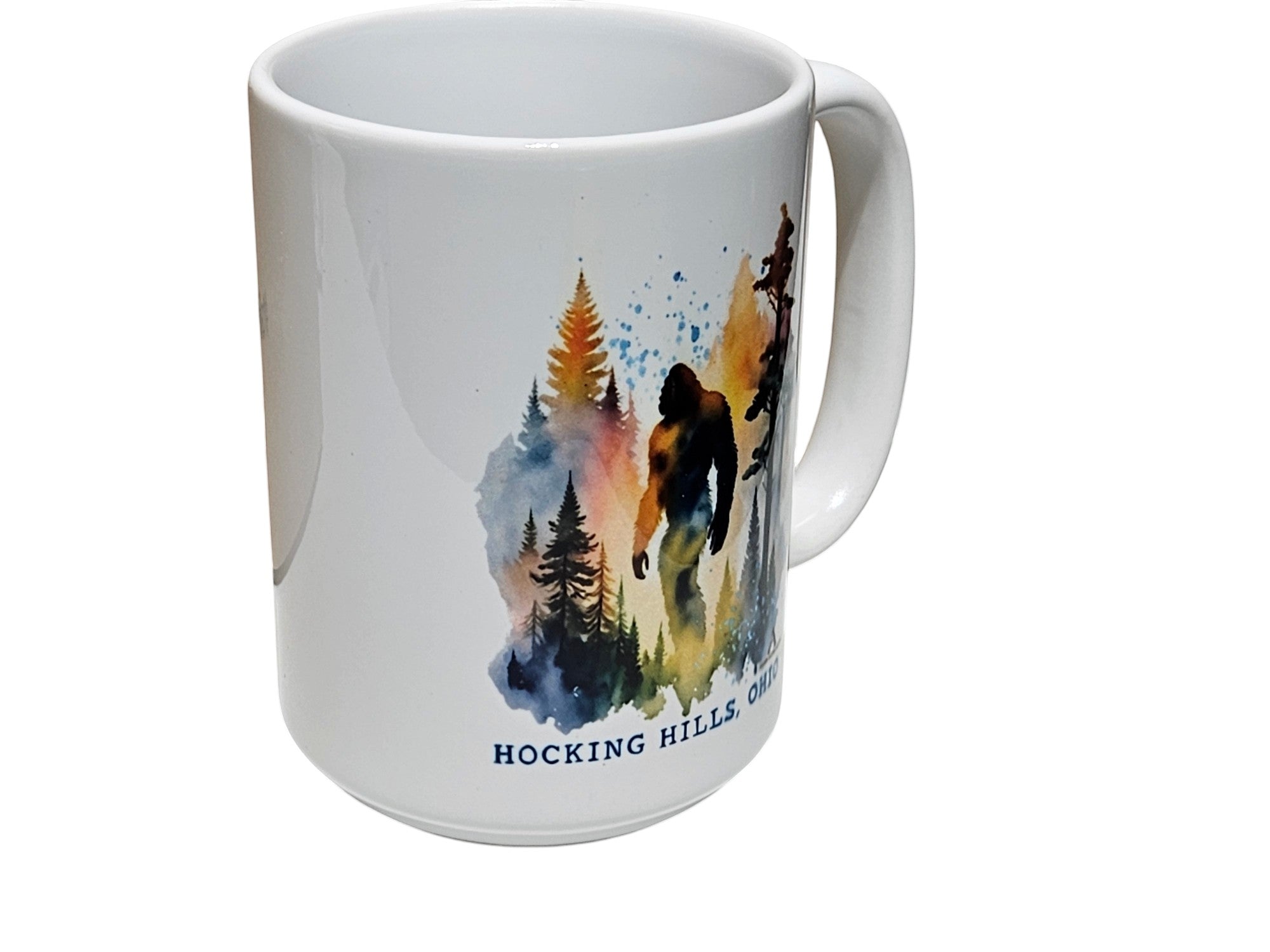 The Hocking Hills Store Sasquatch Big Foot watercolor design on a 15oz white ceramic coffee mug.