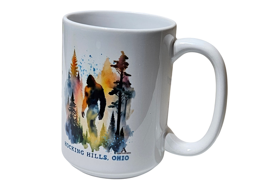 The Hocking Hills Store Sasquatch Big Foot watercolor design on a white ceramic coffee mug.