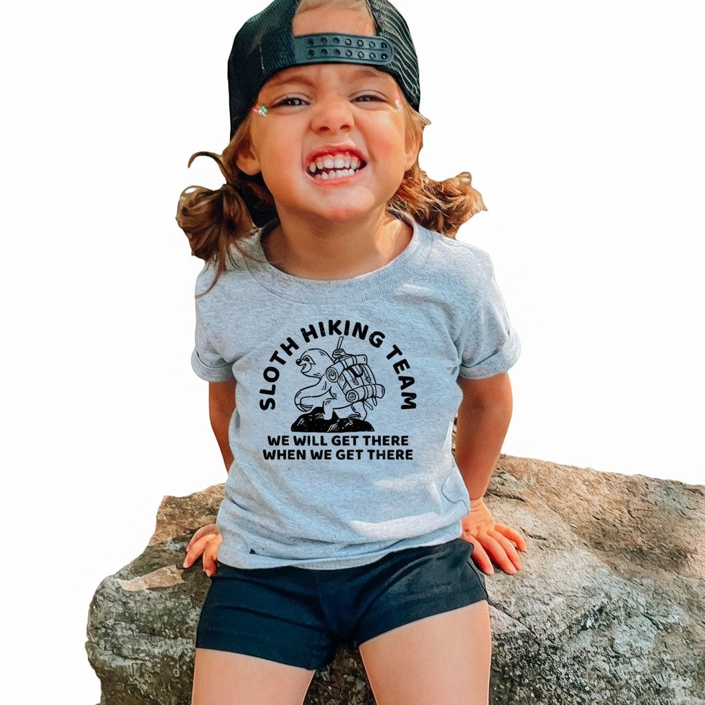 The Hocking Hills Store grey toddler t-shirt with a sloth hiking graphic and humorous slogan.