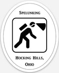 The Hocking Hills Store Spelunking bumper sticker with black text and icon on white oval background.