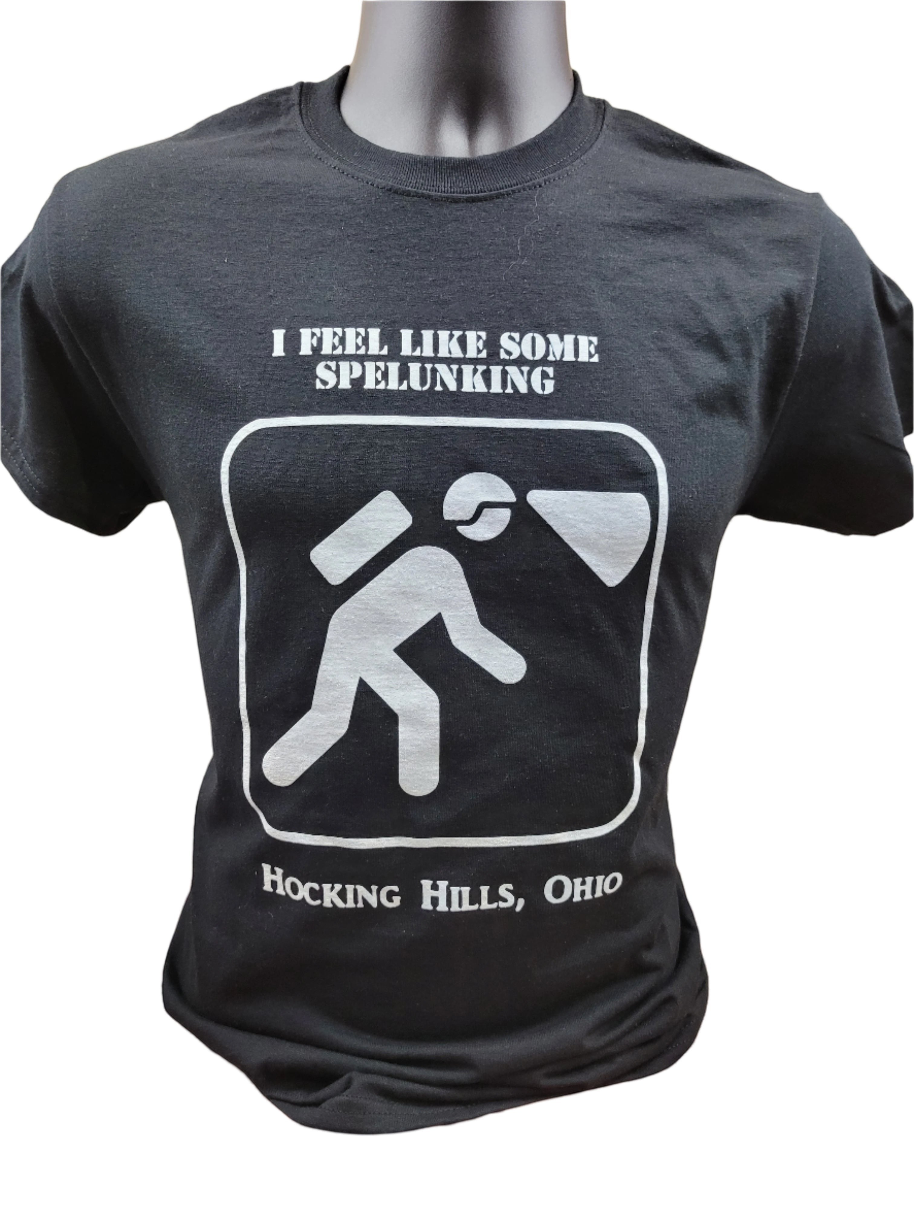 The Hocking Hills Store black cotton t-shirt with white graphic of a spelunker and text "I FEEL LIKE SOME SPELUNKING HOCKING HILLS, OHIO".