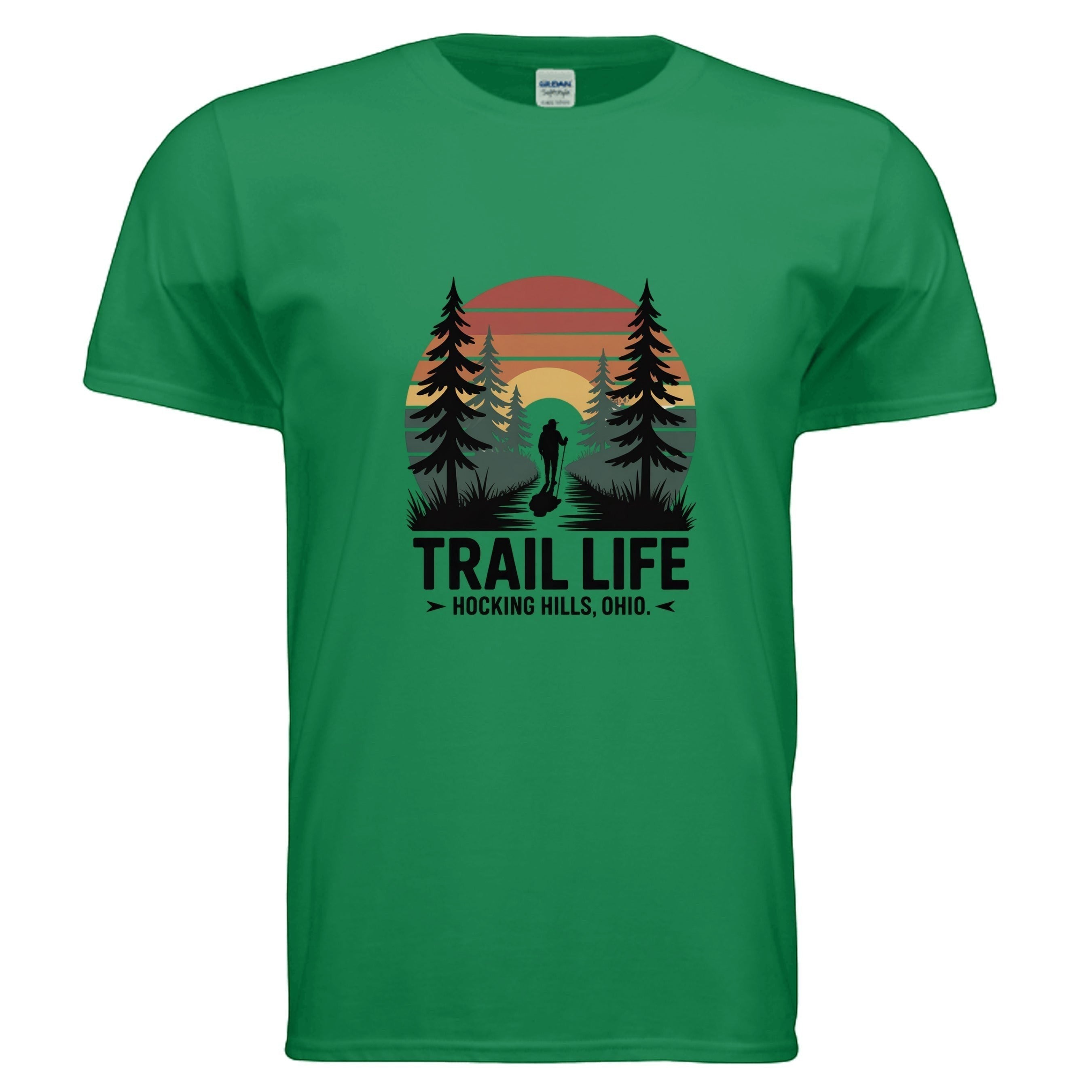 The Hocking Hills Store green cotton t-shirt with a sunset graphic and hiker on a trail. Features "TRAIL LIFE" and "HOCKING HILLS, OHIO."