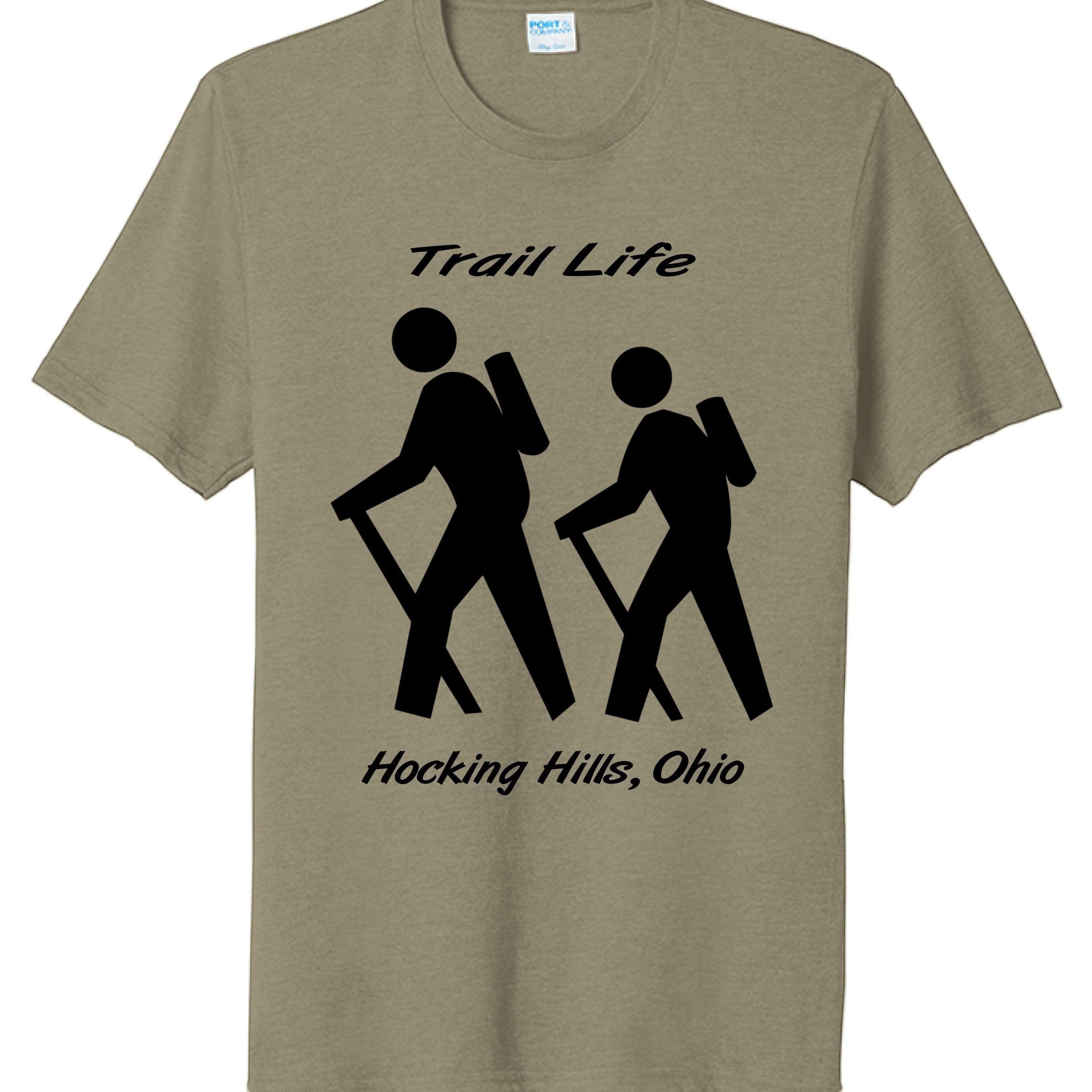 The Hocking Hills Store Trail Life t-shirt in olive green, featuring two black hiker silhouettes and text.