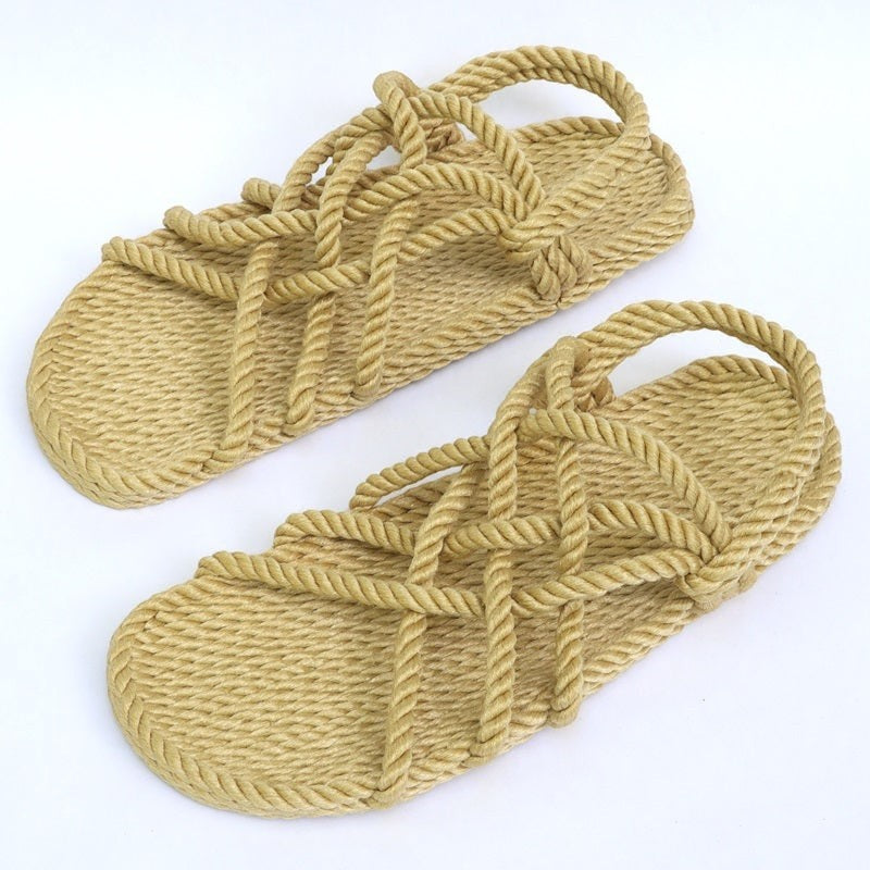 The Hocking Hills Store Utopian Rope Sandals are artisanally handcrafted from polypropylene rope in a natural tan color. These comfortable, lightweight sandals feature a woven rope design and are ideal for water activities.