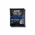 The Hocking Hills Store Wildland Coffee single-serve extra dark roast coffee bag, compostable, with tasting notes of dark chocolate and caramel.