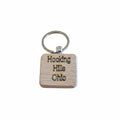 The Hocking Hills Store wood engraved keychain with "Hocking Hills Ohio" text. Natural wood square.