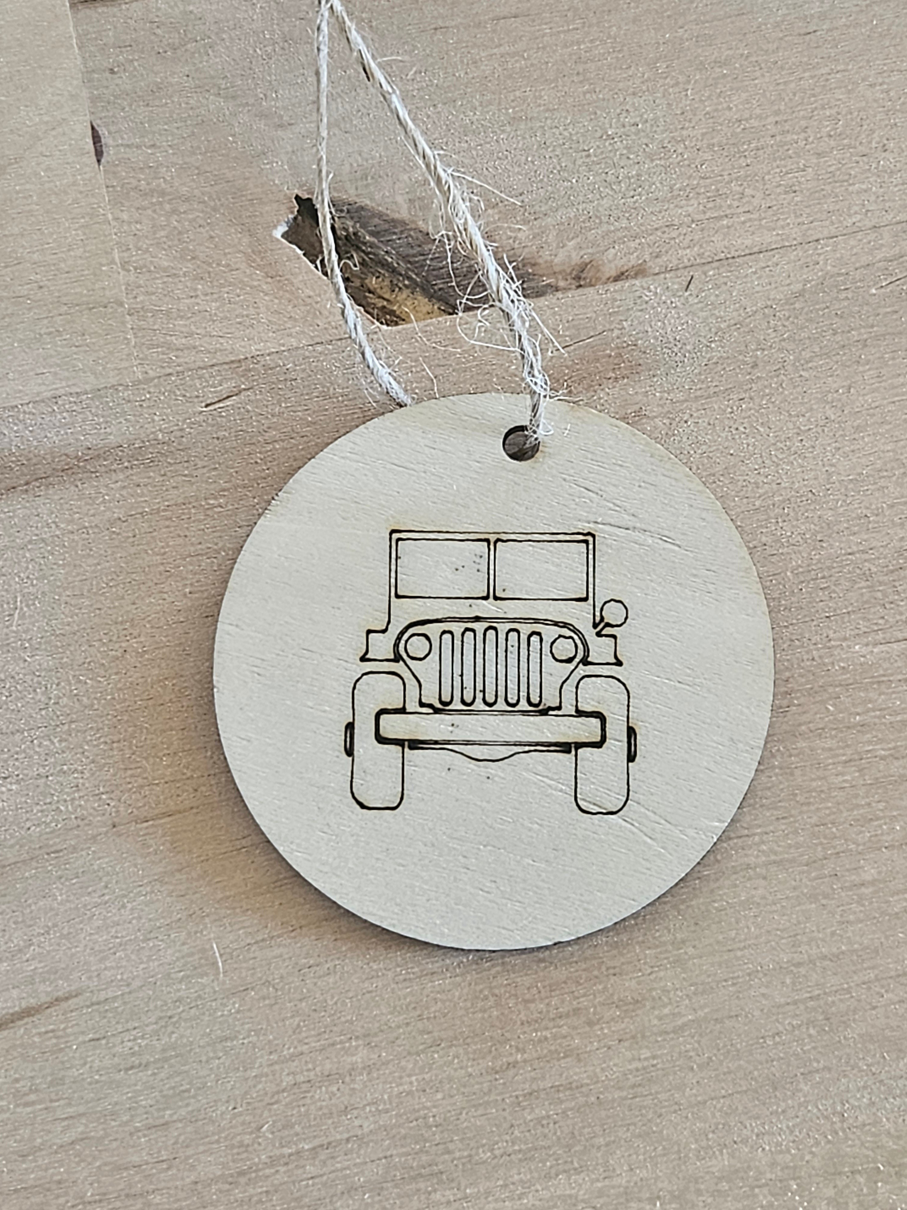 The Hocking Hills Store wood engraved collectible Christmas ornament featuring a jeep graphic.