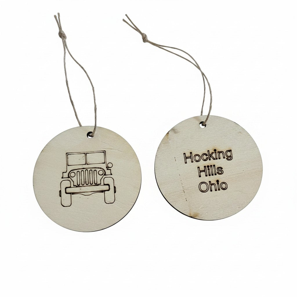 The Hocking Hills Store wood engraved collectable Christmas ornament featuring a jeep on one side and Hocking Hills Ohio engraved on the other.