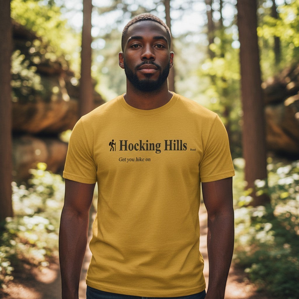 The Hocking Hills Store yellow graphic t-shirt with "Hocking Hills" text and a hiker icon.