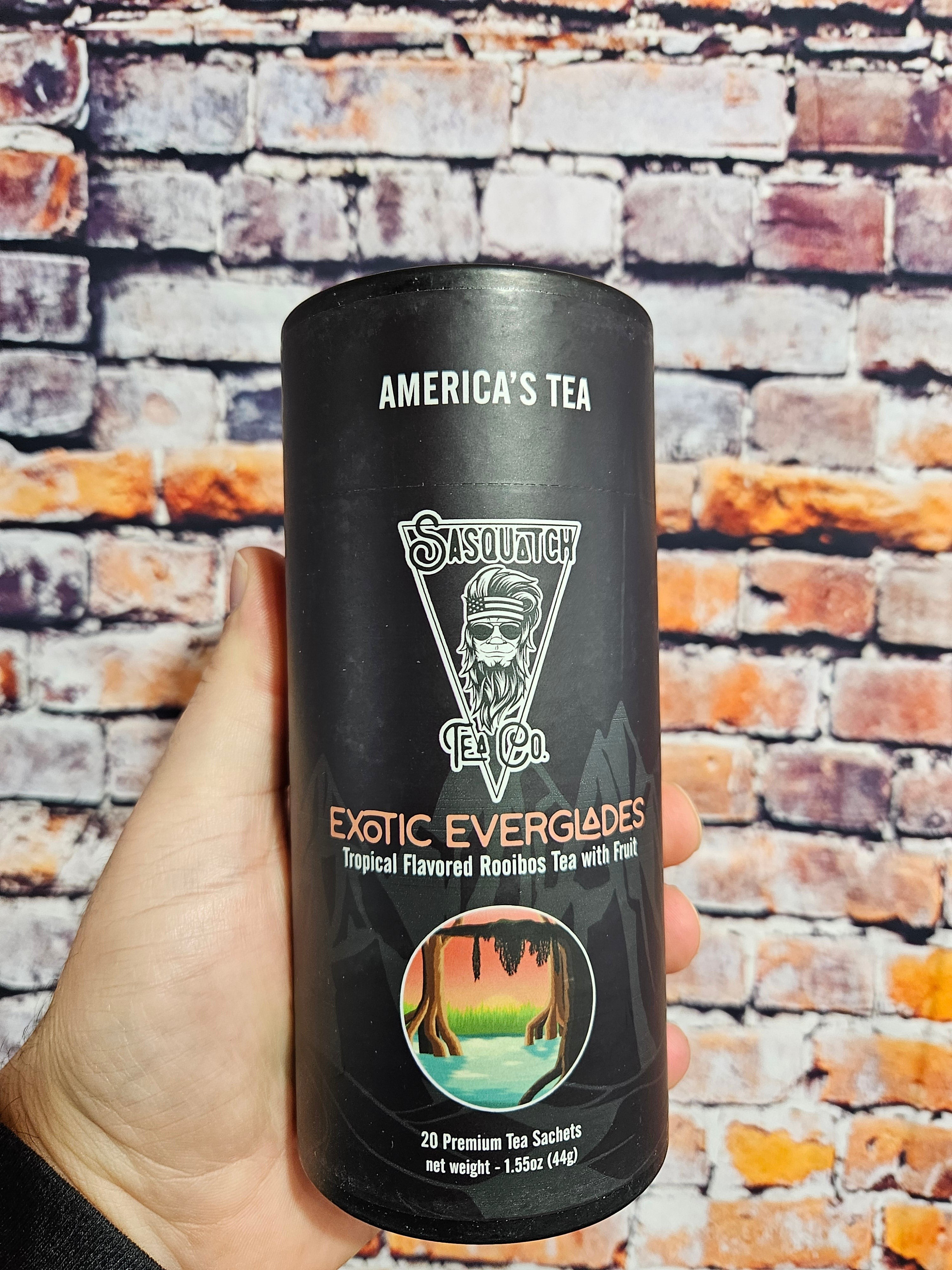 The Hocking Hills Store Sasquatch Tea Exotic Everglades tropical flavored rooibos tea in a black cylinder with 20 premium tea sachets.