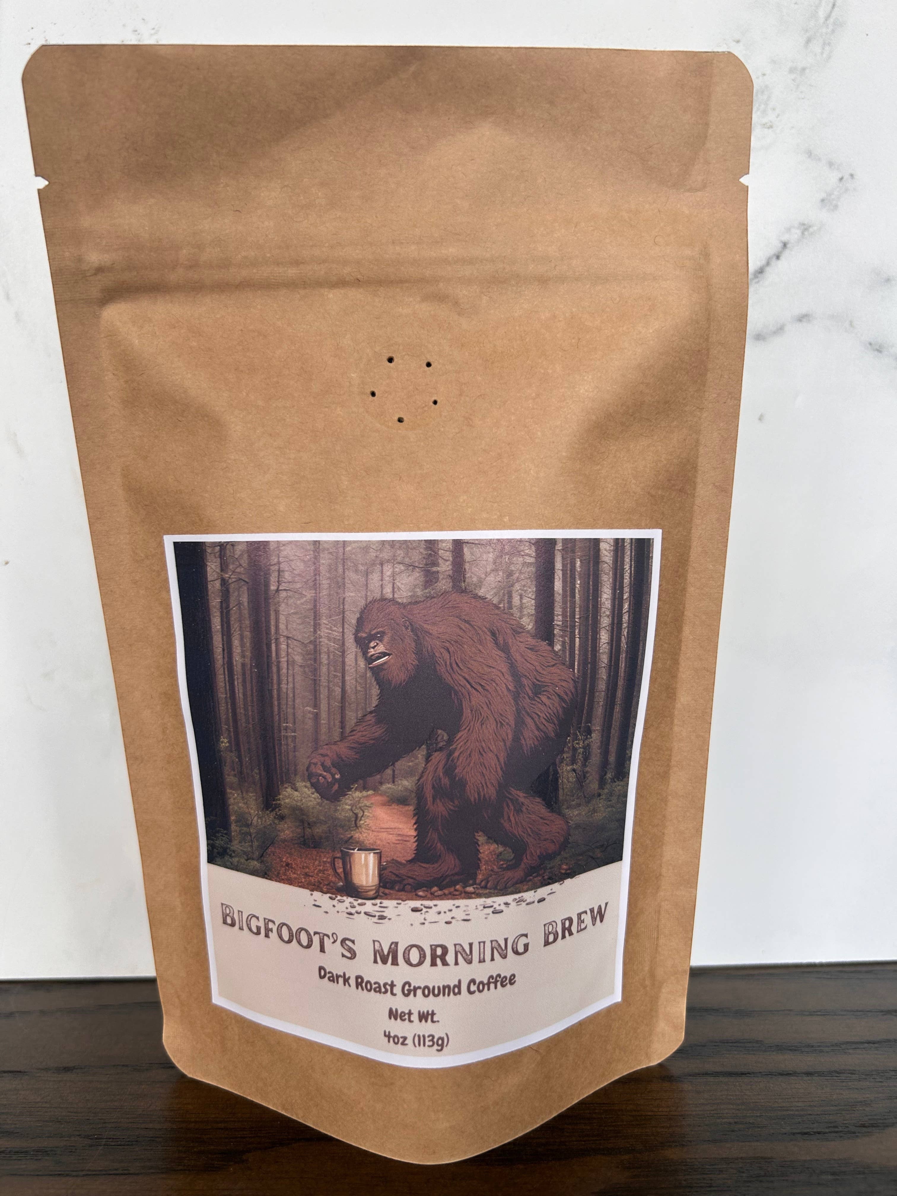 The Hocking Hills Store Bigfoot's Morning Brew dark roast ground coffee in a 4oz bag with a Bigfoot illustration.
